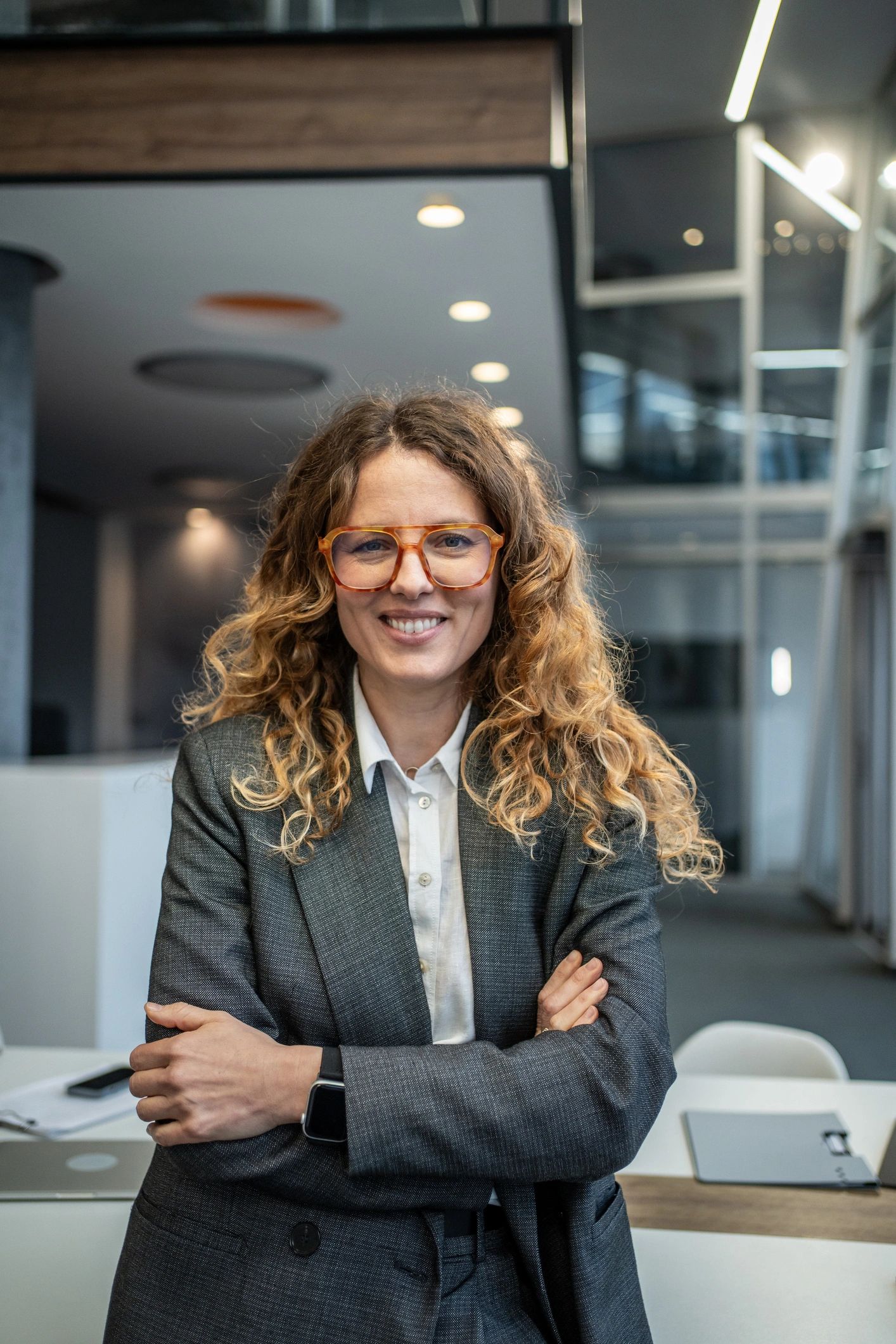 Professional headshot representing editorial role